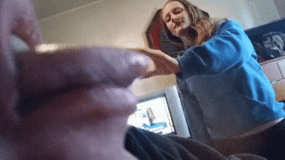 Woman In Blue Sweater Holding Man's Hand GIF