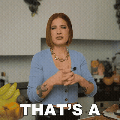 Woman In Blue Sweater Saying That's A In Kitchen GIF