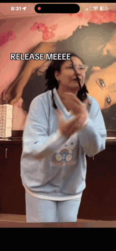 Woman In Blue Sweater Says Release Meeee GIF
