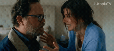 Woman In Blue Sweater Touching Man's Face Utopiatv GIF