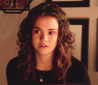 Woman In Blue Sweatshirt Holding Cup GIF