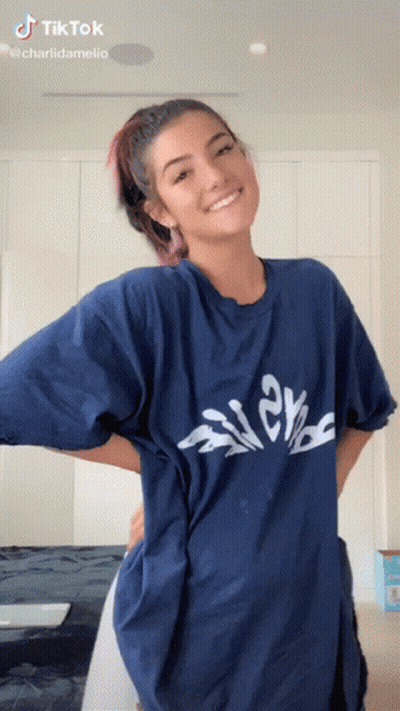 Woman In Blue T-Shirt Smiling GIF
