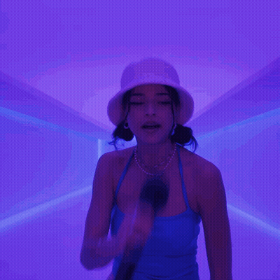 Woman In Blue Tank Top And White Hat GIF