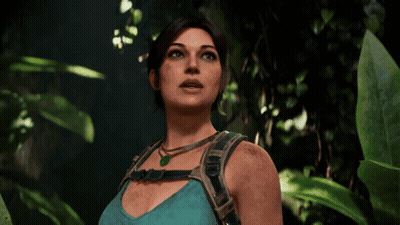 Woman In Blue Tank Top, Green Necklace, Jungle GIF