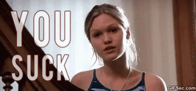 Woman In Blue Tank Top Says You Suck GIF