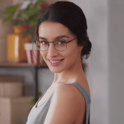 Woman In Blue Top Smiling GIF