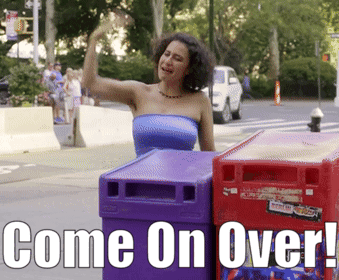 Woman In Blue Top Standing Next To Red Trash Can Come On Over GIF