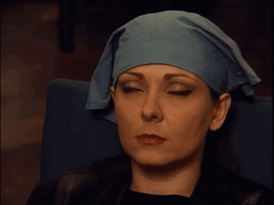 Woman In Blue Towel Smiling GIF