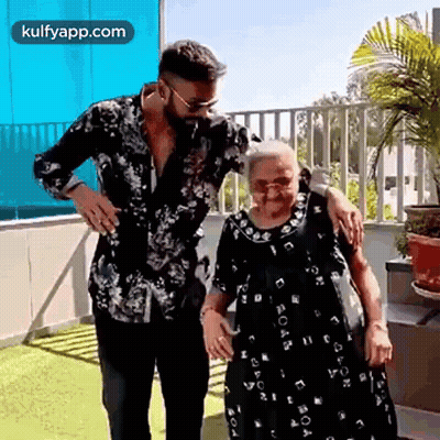 Woman In Blue Tyrrells Shirt GIF