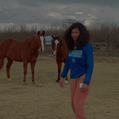 Woman In Blue UC Merced Shirt GIF