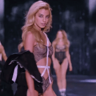 Woman In Bodysuit Walking Runway GIF