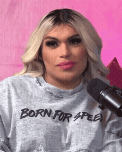 Woman In Born For Speed Sweatshirt At Microphone GIF
