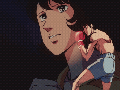 Woman In Boxing Gloves And Man In Shorts GIF