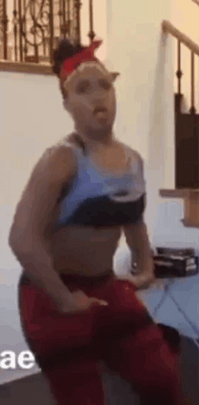 Woman In Bra And Red Pants Dancing GIF