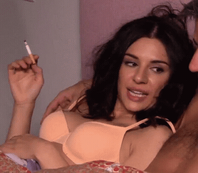 Woman In Bra Smoking Cigarette GIF