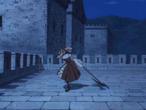 Woman In Brown Dress Holding Long Stick GIF