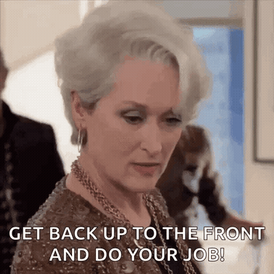 Woman In Brown Dress Saying Get Back Up GIF