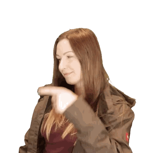 Woman In Brown Jacket With Red Emblem Sticker