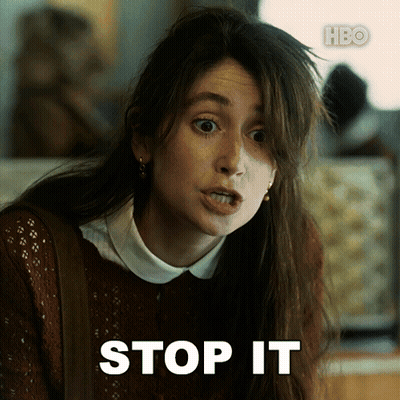 Woman In Brown Sweater Saying Stop It GIF