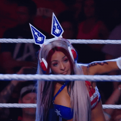 Woman In Bunny Ears And Headphones In Ring GIF