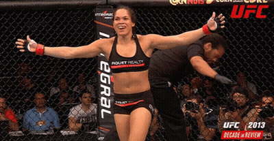 Woman In Cage With UFC Sign GIF