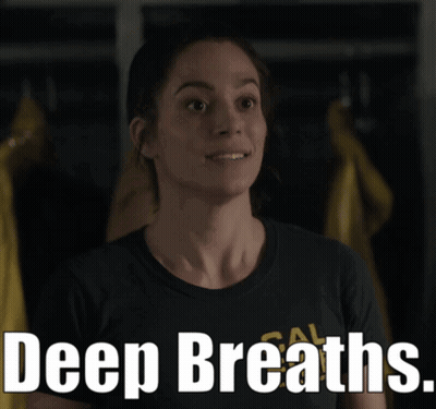 Woman In Cal Shirt Saying Deep Breaths GIF