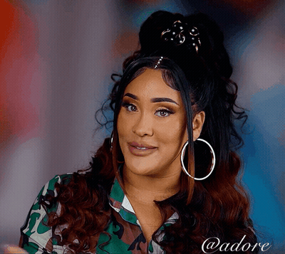Woman In Camo Shirt And Hoop Earrings @Adore GIF