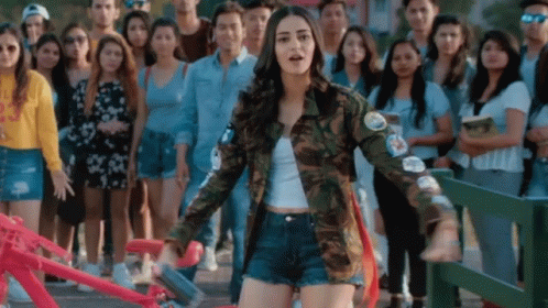 Woman In Camouflage Jacket GIF