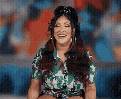 Woman In Camouflage Shirt Smiling GIF