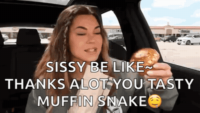 Woman In Car Eating Muffin Says Sissy Be Like Thanks Alot You Tasty Muffin Snake GIF