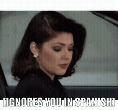 Woman In Car Ignores You In Spanish GIF