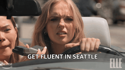 Woman In Car Saying Get Fluent In Seattle GIF