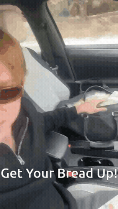 Woman In Car Saying Get Your Bread Up GIF