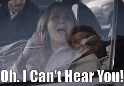 Woman In Car Saying Oh I Can't Hear You GIF