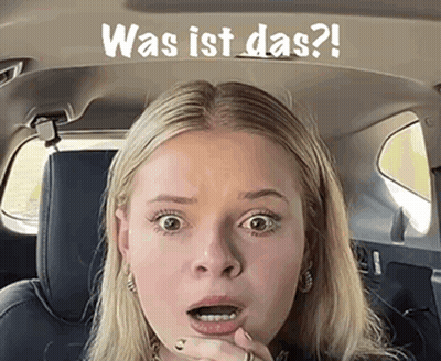 Woman In Car Saying Was Ist Das GIF