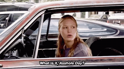 Woman In Car Says What Is It Asshole Day GIF