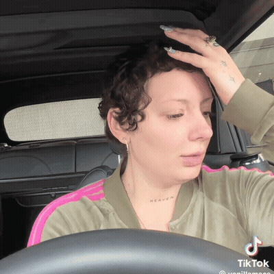 Woman In Car With Heaven Neck Tattoo GIF