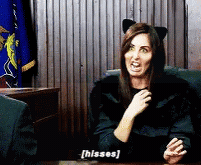 Woman In Cat Costume Hisses GIF