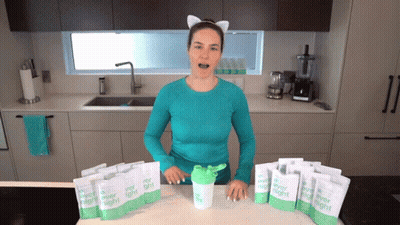 Woman In Cat Ear Headband With Ever Light Packets And Shaker GIF