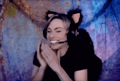 Woman In Cat Ear Headset Smiling And Clapping GIF