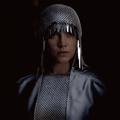 Woman In Chain Mail Helmet And Silver Jacket GIF