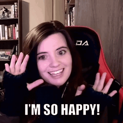 Woman In Chair Saying I'm So Happy GIF