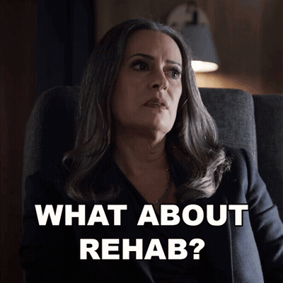 Woman In Chair Saying What About Rehab GIF