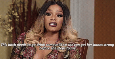 Woman In Chair Talking About Milk GIF