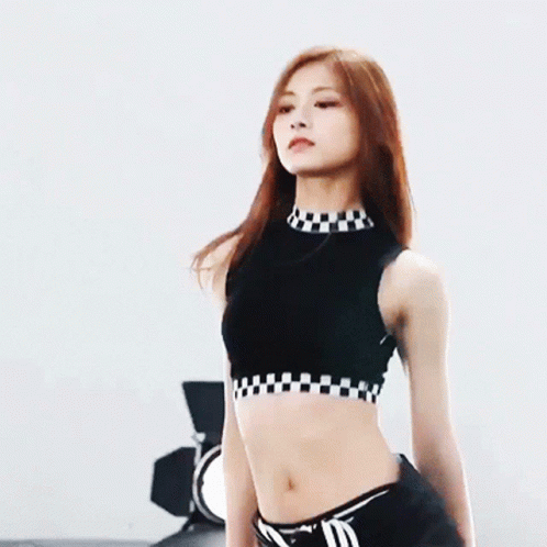 Woman In Checkered Crop Top GIF