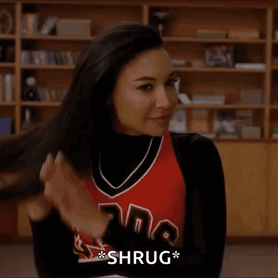 Woman In Cheerleader Uniform Holding Hair GIF
