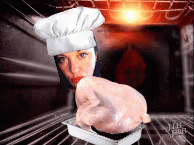 Woman In Chef Hat Holding Turkey GIF