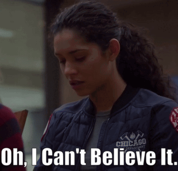 Woman In Chicago Fire Department Jacket GIF