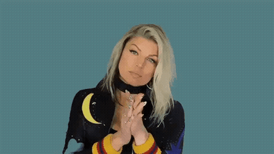 Woman In Choker And Black Jacket Making Funny Face GIF