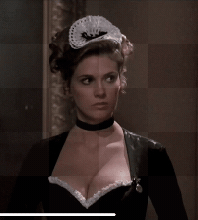 Woman In Choker And Maid Hat Looking At Camera GIF